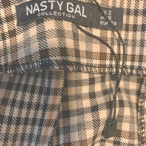 Nasty gal zip up straight mini,  size 2.  15” long. Zips up back